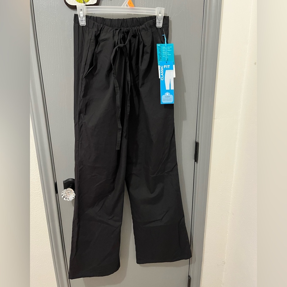 NWT mid rise drawstring waist, side seam pockets.